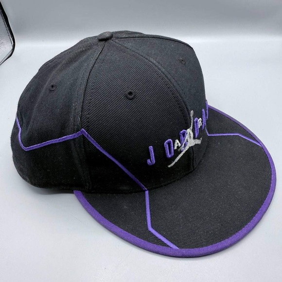 black and purple jordan 23